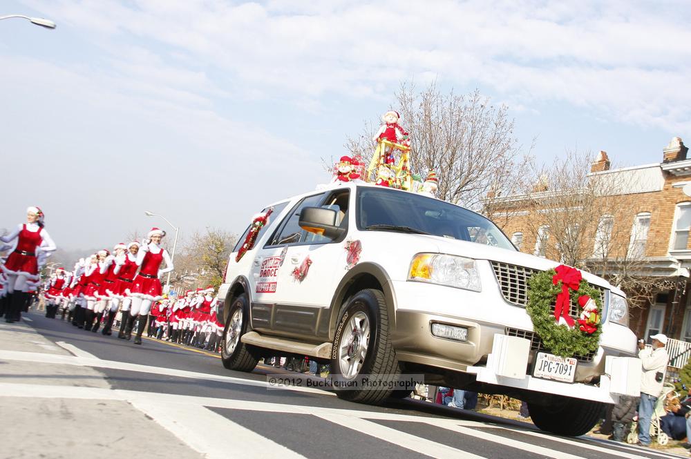 40th Annual Mayors Christmas Parade 2012\nPhotography by: Buckleman Photography\nall images ©2012 Buckleman Photography\nThe images displayed here are of low resolution;\nReprints available,  please contact us: \ngerard@bucklemanphotography.com\n410.608.7990\nbucklemanphotography.com\nFile Number - 5539.jpg