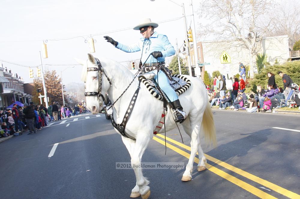 40th Annual Mayors Christmas Parade 2012\nPhotography by: Buckleman Photography\nall images ©2012 Buckleman Photography\nThe images displayed here are of low resolution;\nReprints available,  please contact us: \ngerard@bucklemanphotography.com\n410.608.7990\nbucklemanphotography.com\nFile Number - 5590.jpg