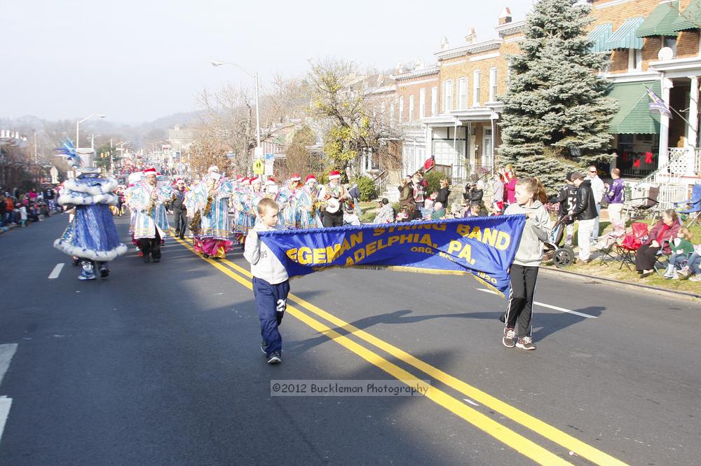 40th Annual Mayors Christmas Parade 2012\nPhotography by: Buckleman Photography\nall images ©2012 Buckleman Photography\nThe images displayed here are of low resolution;\nReprints available,  please contact us: \ngerard@bucklemanphotography.com\n410.608.7990\nbucklemanphotography.com\nFile Number - 5594.jpg