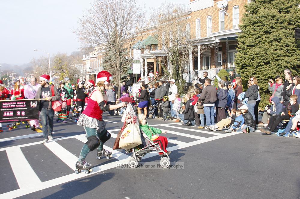 40th Annual Mayors Christmas Parade 2012\nPhotography by: Buckleman Photography\nall images ©2012 Buckleman Photography\nThe images displayed here are of low resolution;\nReprints available,  please contact us: \ngerard@bucklemanphotography.com\n410.608.7990\nbucklemanphotography.com\nFile Number - 5608.jpg