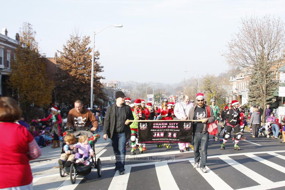 40th Annual Mayors Christmas Parade 2012\nPhotography by: Buckleman Photography\nall images ©2012 Buckleman Photography\nThe images displayed here are of low resolution;\nReprints available,  please contact us: \ngerard@bucklemanphotography.com\n410.608.7990\nbucklemanphotography.com\nFile Number - 5609.jpg