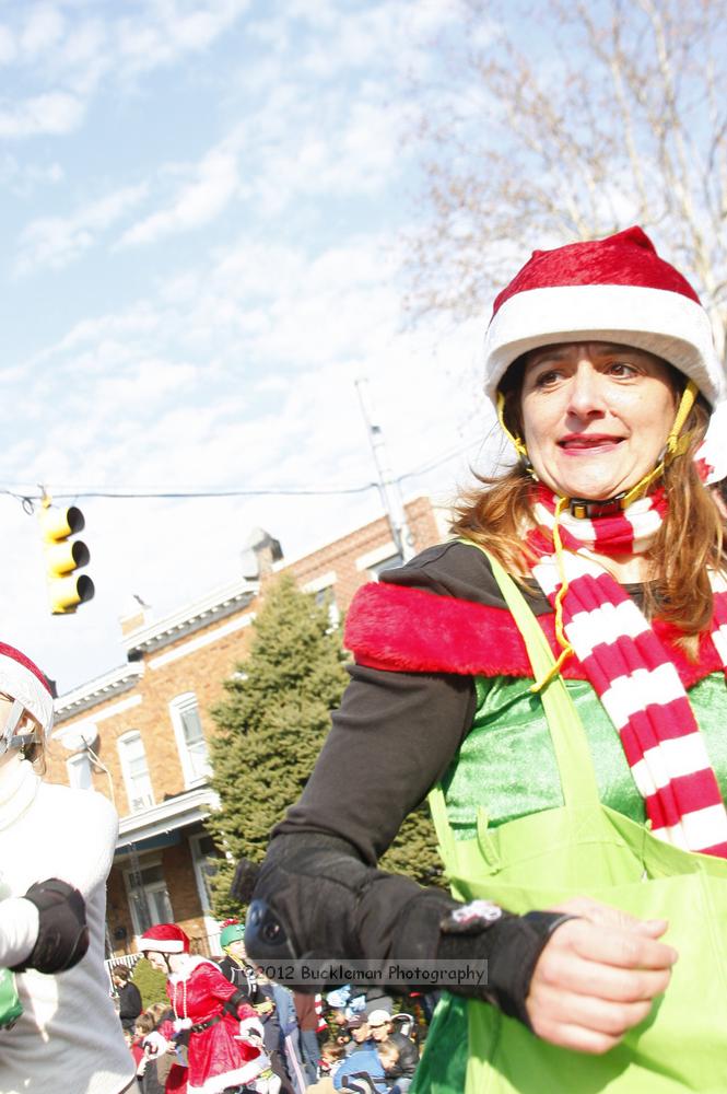 40th Annual Mayors Christmas Parade 2012\nPhotography by: Buckleman Photography\nall images ©2012 Buckleman Photography\nThe images displayed here are of low resolution;\nReprints available,  please contact us: \ngerard@bucklemanphotography.com\n410.608.7990\nbucklemanphotography.com\nFile Number - 5611.jpg
