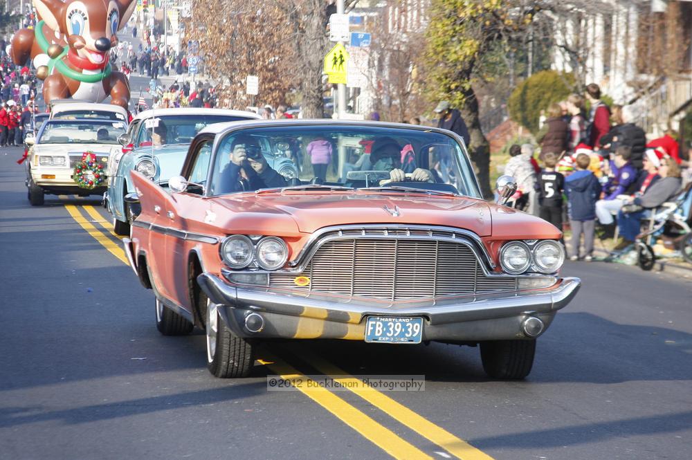 40th Annual Mayors Christmas Parade 2012\nPhotography by: Buckleman Photography\nall images ©2012 Buckleman Photography\nThe images displayed here are of low resolution;\nReprints available,  please contact us: \ngerard@bucklemanphotography.com\n410.608.7990\nbucklemanphotography.com\nFile Number - 5618.jpg