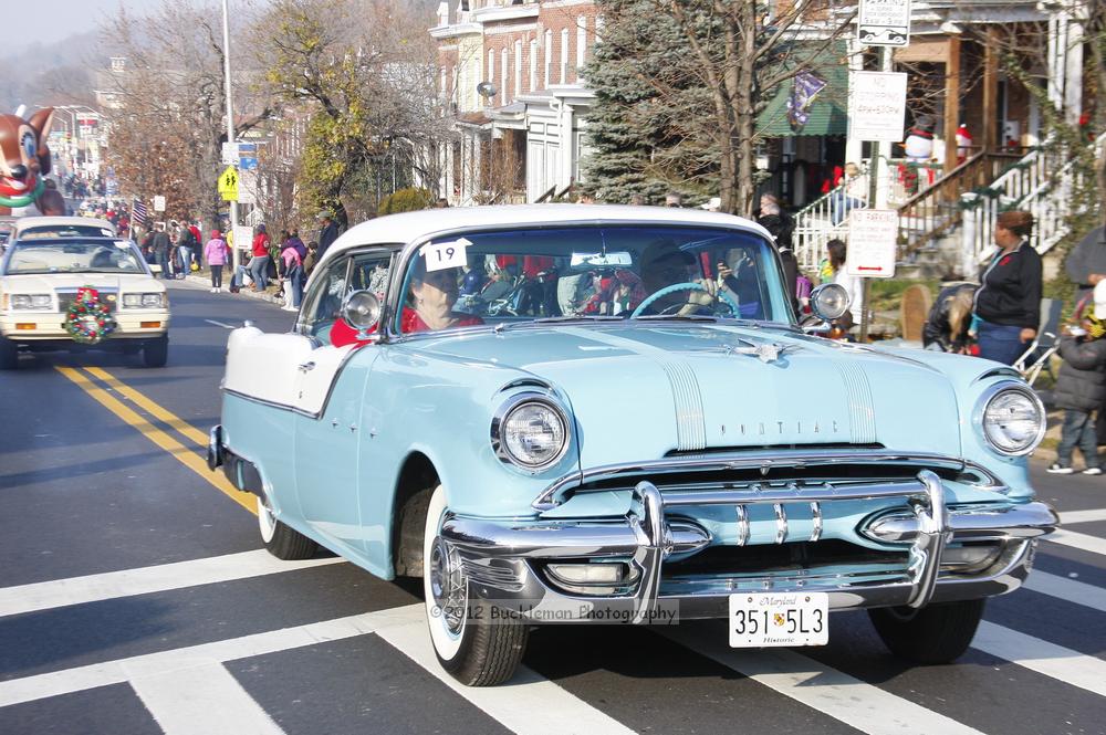 40th Annual Mayors Christmas Parade 2012\nPhotography by: Buckleman Photography\nall images ©2012 Buckleman Photography\nThe images displayed here are of low resolution;\nReprints available,  please contact us: \ngerard@bucklemanphotography.com\n410.608.7990\nbucklemanphotography.com\nFile Number - 5620.jpg