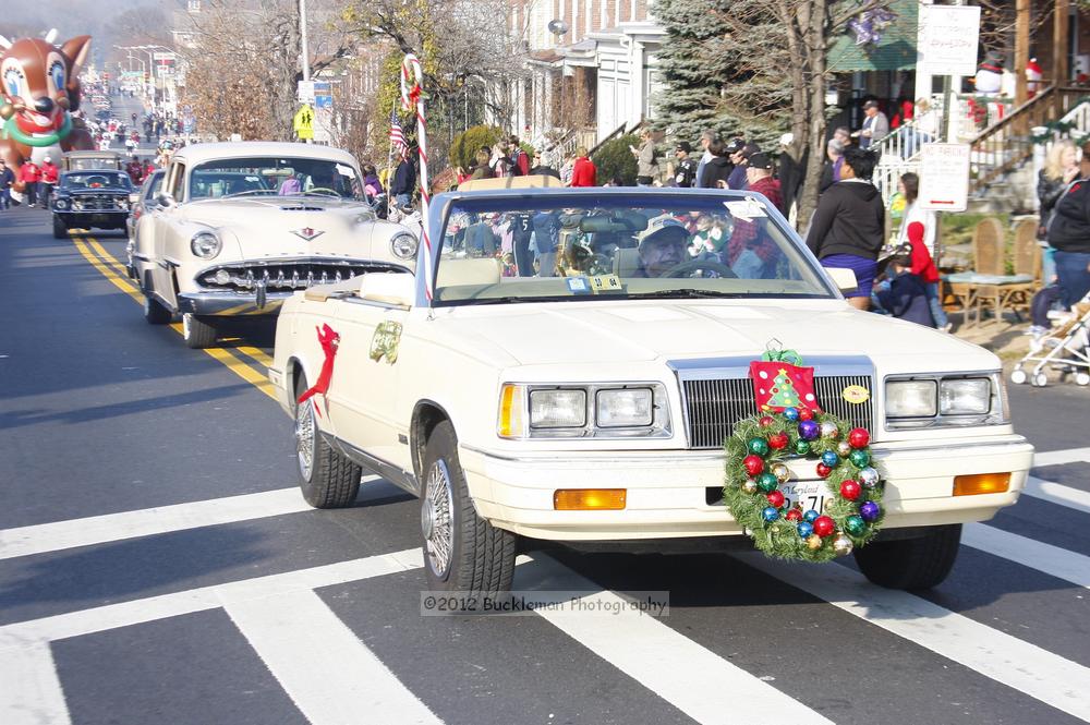 40th Annual Mayors Christmas Parade 2012\nPhotography by: Buckleman Photography\nall images ©2012 Buckleman Photography\nThe images displayed here are of low resolution;\nReprints available,  please contact us: \ngerard@bucklemanphotography.com\n410.608.7990\nbucklemanphotography.com\nFile Number - 5621.jpg