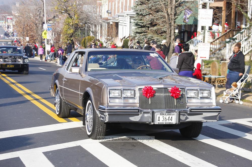 40th Annual Mayors Christmas Parade 2012\nPhotography by: Buckleman Photography\nall images ©2012 Buckleman Photography\nThe images displayed here are of low resolution;\nReprints available,  please contact us: \ngerard@bucklemanphotography.com\n410.608.7990\nbucklemanphotography.com\nFile Number - 5624.jpg