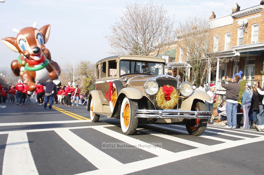 40th Annual Mayors Christmas Parade 2012\nPhotography by: Buckleman Photography\nall images ©2012 Buckleman Photography\nThe images displayed here are of low resolution;\nReprints available,  please contact us: \ngerard@bucklemanphotography.com\n410.608.7990\nbucklemanphotography.com\nFile Number - 5631.jpg