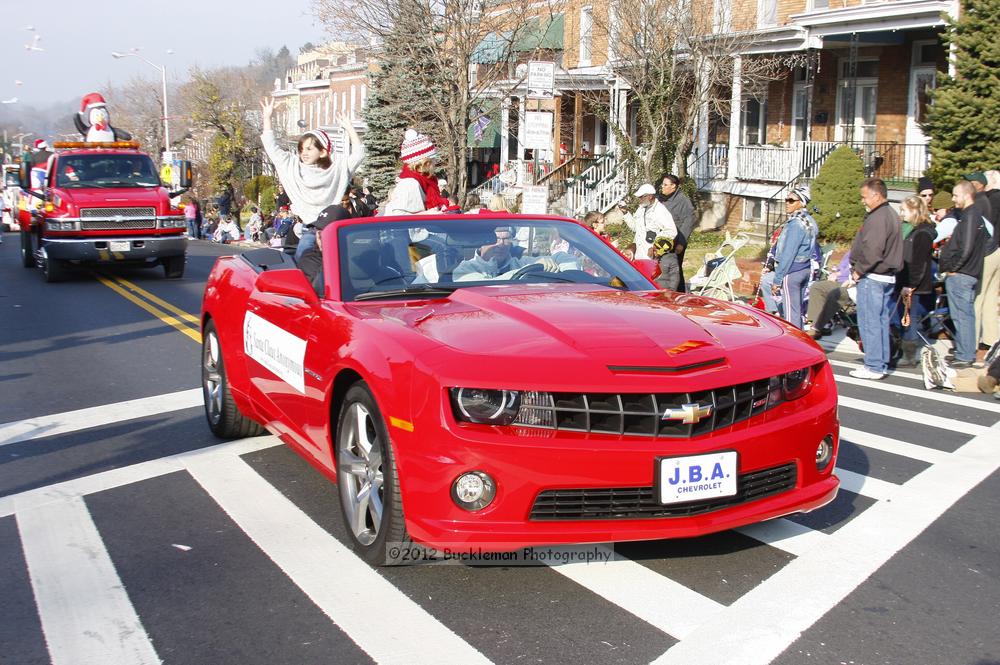 40th Annual Mayors Christmas Parade 2012\nPhotography by: Buckleman Photography\nall images ©2012 Buckleman Photography\nThe images displayed here are of low resolution;\nReprints available,  please contact us: \ngerard@bucklemanphotography.com\n410.608.7990\nbucklemanphotography.com\nFile Number - 5665.jpg