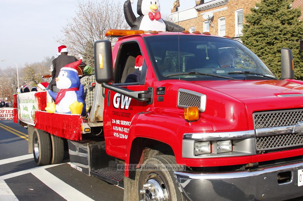 40th Annual Mayors Christmas Parade 2012\nPhotography by: Buckleman Photography\nall images ©2012 Buckleman Photography\nThe images displayed here are of low resolution;\nReprints available,  please contact us: \ngerard@bucklemanphotography.com\n410.608.7990\nbucklemanphotography.com\nFile Number - 5667.jpg