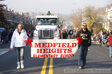 40th Annual Mayors Christmas Parade 2012\nPhotography by: Buckleman Photography\nall images ©2012 Buckleman Photography\nThe images displayed here are of low resolution;\nReprints available,  please contact us: \ngerard@bucklemanphotography.com\n410.608.7990\nbucklemanphotography.com\nFile Number - 5669.jpg