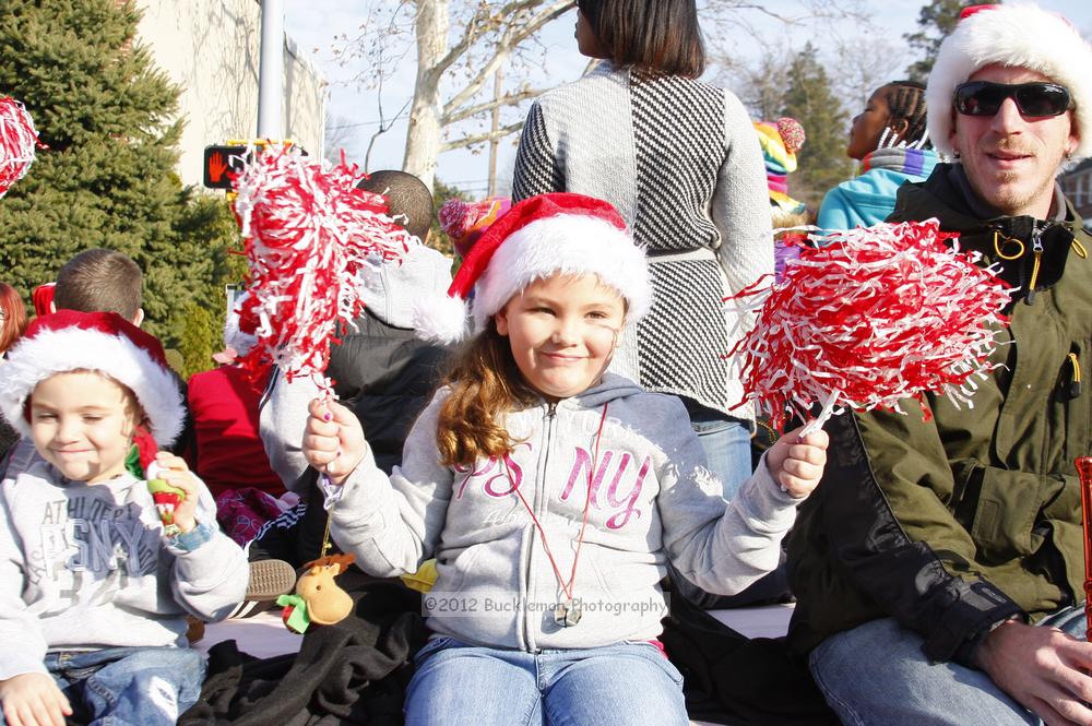 40th Annual Mayors Christmas Parade 2012\nPhotography by: Buckleman Photography\nall images ©2012 Buckleman Photography\nThe images displayed here are of low resolution;\nReprints available,  please contact us: \ngerard@bucklemanphotography.com\n410.608.7990\nbucklemanphotography.com\nFile Number - 5672.jpg