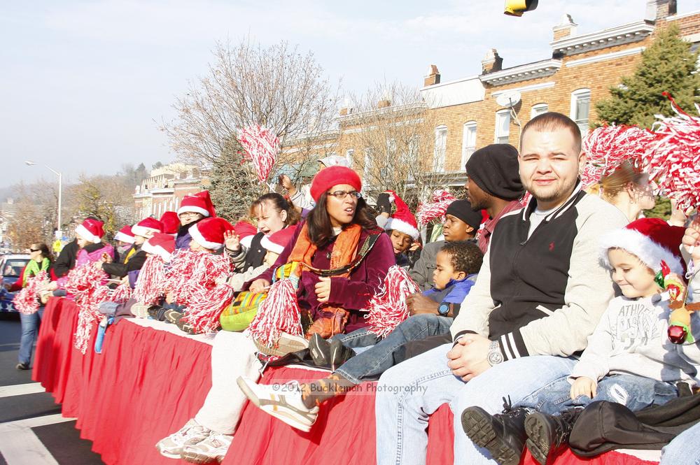 40th Annual Mayors Christmas Parade 2012\nPhotography by: Buckleman Photography\nall images ©2012 Buckleman Photography\nThe images displayed here are of low resolution;\nReprints available,  please contact us: \ngerard@bucklemanphotography.com\n410.608.7990\nbucklemanphotography.com\nFile Number - 5674.jpg