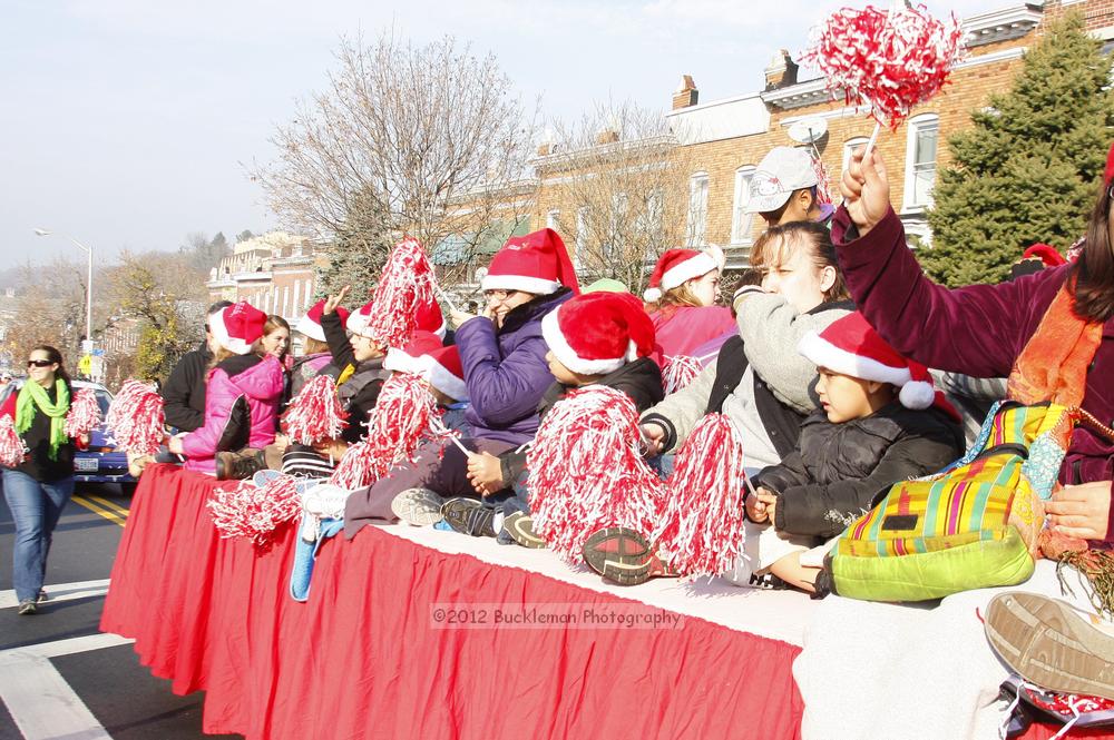 40th Annual Mayors Christmas Parade 2012\nPhotography by: Buckleman Photography\nall images ©2012 Buckleman Photography\nThe images displayed here are of low resolution;\nReprints available,  please contact us: \ngerard@bucklemanphotography.com\n410.608.7990\nbucklemanphotography.com\nFile Number - 5675.jpg