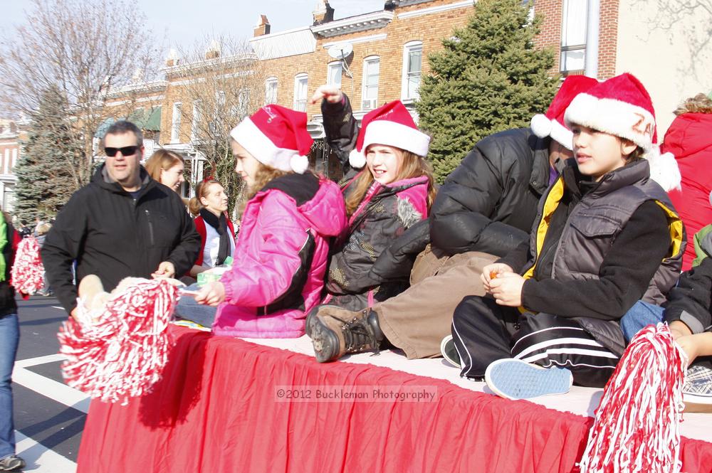 40th Annual Mayors Christmas Parade 2012\nPhotography by: Buckleman Photography\nall images ©2012 Buckleman Photography\nThe images displayed here are of low resolution;\nReprints available,  please contact us: \ngerard@bucklemanphotography.com\n410.608.7990\nbucklemanphotography.com\nFile Number - 5678.jpg