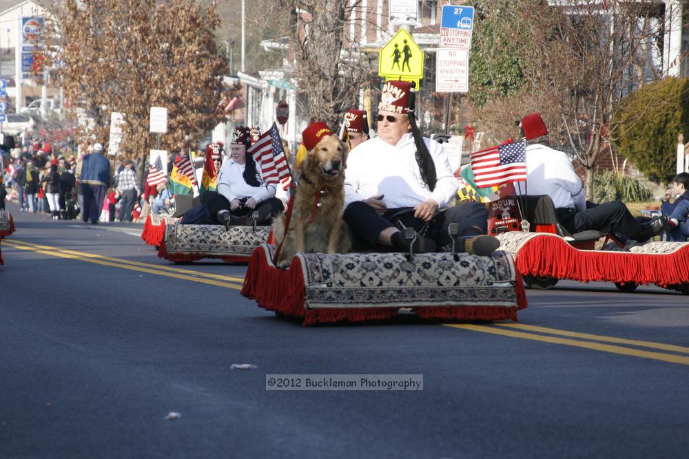 40th Annual Mayors Christmas Parade 2012\nPhotography by: Buckleman Photography\nall images ©2012 Buckleman Photography\nThe images displayed here are of low resolution;\nReprints available,  please contact us: \ngerard@bucklemanphotography.com\n410.608.7990\nbucklemanphotography.com\nFile Number 2361.jpg