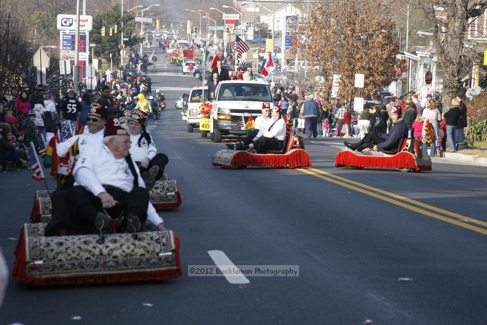 40th Annual Mayors Christmas Parade 2012\nPhotography by: Buckleman Photography\nall images ©2012 Buckleman Photography\nThe images displayed here are of low resolution;\nReprints available,  please contact us: \ngerard@bucklemanphotography.com\n410.608.7990\nbucklemanphotography.com\nFile Number 2363.jpg