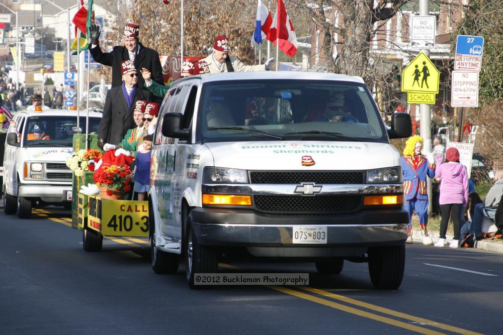 40th Annual Mayors Christmas Parade 2012\nPhotography by: Buckleman Photography\nall images ©2012 Buckleman Photography\nThe images displayed here are of low resolution;\nReprints available,  please contact us: \ngerard@bucklemanphotography.com\n410.608.7990\nbucklemanphotography.com\nFile Number 2369.jpg