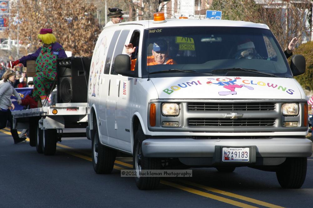 40th Annual Mayors Christmas Parade 2012\nPhotography by: Buckleman Photography\nall images ©2012 Buckleman Photography\nThe images displayed here are of low resolution;\nReprints available,  please contact us: \ngerard@bucklemanphotography.com\n410.608.7990\nbucklemanphotography.com\nFile Number 2372.jpg