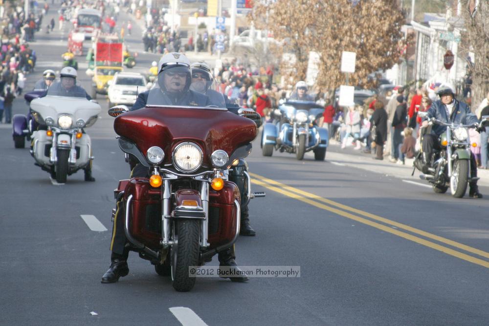 40th Annual Mayors Christmas Parade 2012\nPhotography by: Buckleman Photography\nall images ©2012 Buckleman Photography\nThe images displayed here are of low resolution;\nReprints available,  please contact us: \ngerard@bucklemanphotography.com\n410.608.7990\nbucklemanphotography.com\nFile Number 2382.jpg