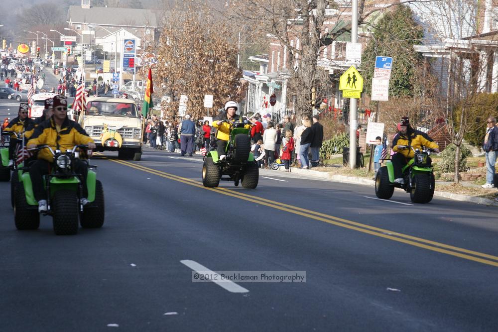 40th Annual Mayors Christmas Parade 2012\nPhotography by: Buckleman Photography\nall images ©2012 Buckleman Photography\nThe images displayed here are of low resolution;\nReprints available,  please contact us: \ngerard@bucklemanphotography.com\n410.608.7990\nbucklemanphotography.com\nFile Number 2392.jpg