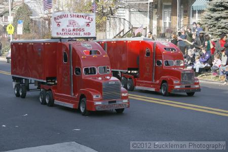 40th Annual Mayors Christmas Parade 2012\nPhotography by: Buckleman Photography\nall images ©2012 Buckleman Photography\nThe images displayed here are of low resolution;\nReprints available,  please contact us: \ngerard@bucklemanphotography.com\n410.608.7990\nbucklemanphotography.com\nFile Number 2402.jpg