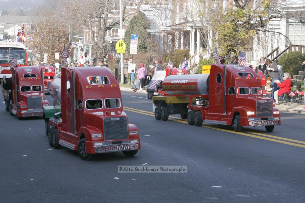 40th Annual Mayors Christmas Parade 2012\nPhotography by: Buckleman Photography\nall images ©2012 Buckleman Photography\nThe images displayed here are of low resolution;\nReprints available,  please contact us: \ngerard@bucklemanphotography.com\n410.608.7990\nbucklemanphotography.com\nFile Number 2403.jpg