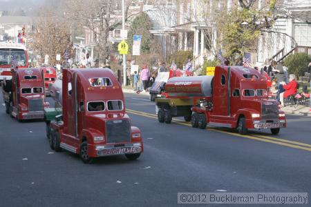 40th Annual Mayors Christmas Parade 2012\nPhotography by: Buckleman Photography\nall images ©2012 Buckleman Photography\nThe images displayed here are of low resolution;\nReprints available,  please contact us: \ngerard@bucklemanphotography.com\n410.608.7990\nbucklemanphotography.com\nFile Number 2403.jpg