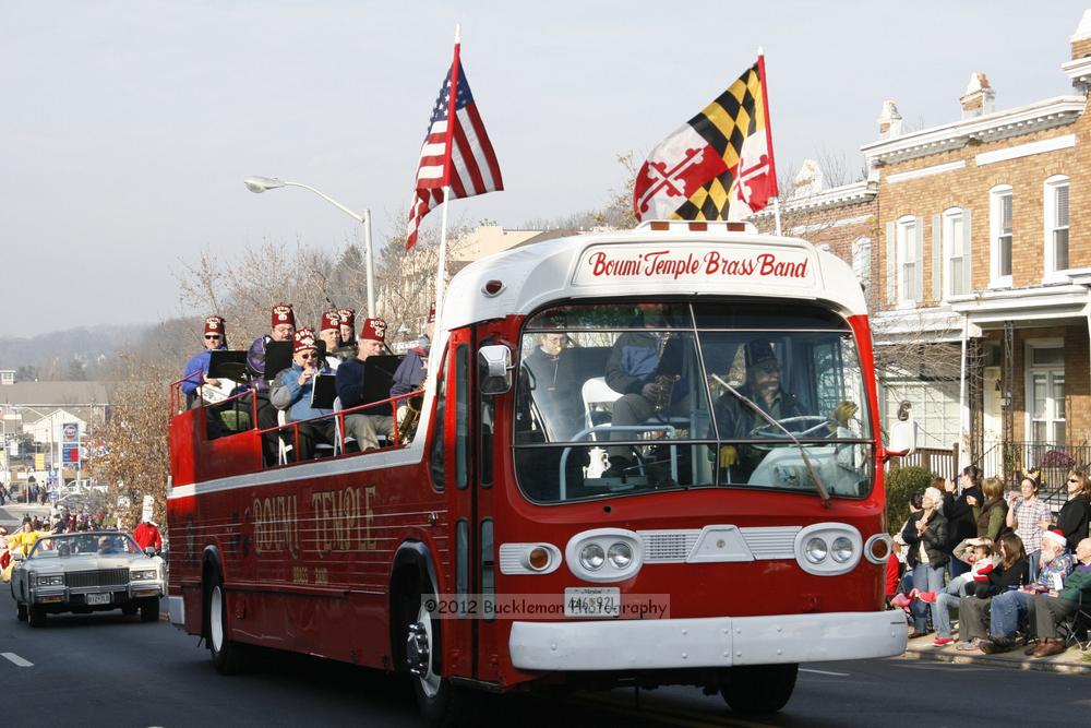 40th Annual Mayors Christmas Parade 2012\nPhotography by: Buckleman Photography\nall images ©2012 Buckleman Photography\nThe images displayed here are of low resolution;\nReprints available,  please contact us: \ngerard@bucklemanphotography.com\n410.608.7990\nbucklemanphotography.com\nFile Number 2409.jpg