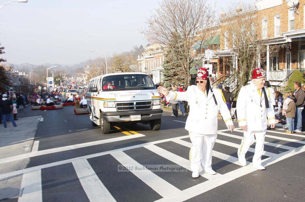 40th Annual Mayors Christmas Parade 2012\nPhotography by: Buckleman Photography\nall images ©2012 Buckleman Photography\nThe images displayed here are of low resolution;\nReprints available,  please contact us: \ngerard@bucklemanphotography.com\n410.608.7990\nbucklemanphotography.com\nFile Number 5726.jpg