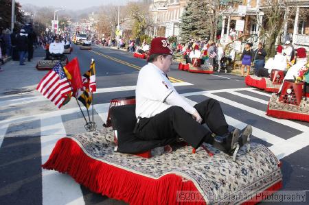 40th Annual Mayors Christmas Parade 2012\nPhotography by: Buckleman Photography\nall images ©2012 Buckleman Photography\nThe images displayed here are of low resolution;\nReprints available,  please contact us: \ngerard@bucklemanphotography.com\n410.608.7990\nbucklemanphotography.com\nFile Number 5732.jpg