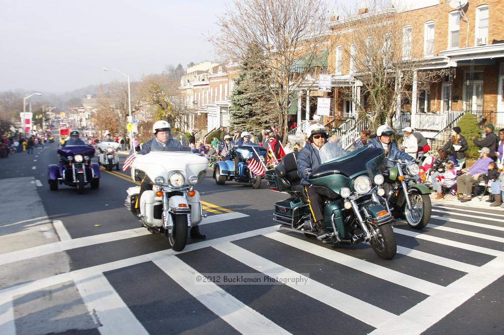 40th Annual Mayors Christmas Parade 2012\nPhotography by: Buckleman Photography\nall images ©2012 Buckleman Photography\nThe images displayed here are of low resolution;\nReprints available,  please contact us: \ngerard@bucklemanphotography.com\n410.608.7990\nbucklemanphotography.com\nFile Number 5745.jpg