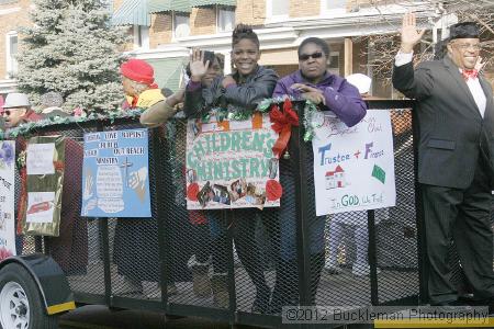 40th Annual Mayors Christmas Parade 2012\nPhotography by: Buckleman Photography\nall images ©2012 Buckleman Photography\nThe images displayed here are of low resolution;\nReprints available,  please contact us: \ngerard@bucklemanphotography.com\n410.608.7990\nbucklemanphotography.com\nFile Number 2431.jpg