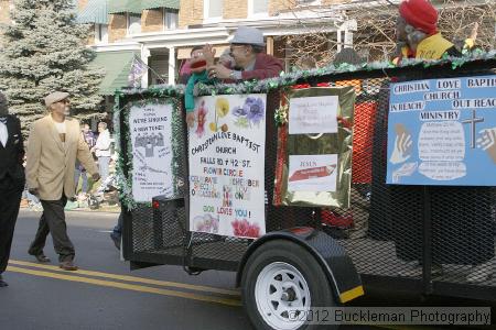 40th Annual Mayors Christmas Parade 2012\nPhotography by: Buckleman Photography\nall images ©2012 Buckleman Photography\nThe images displayed here are of low resolution;\nReprints available,  please contact us: \ngerard@bucklemanphotography.com\n410.608.7990\nbucklemanphotography.com\nFile Number 2432.jpg