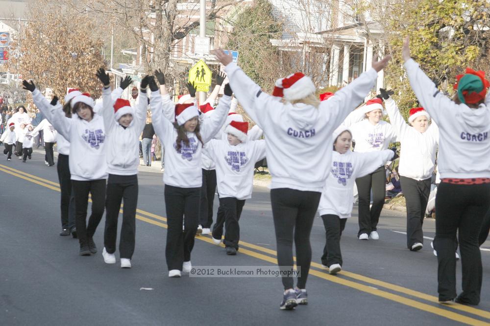 40th Annual Mayors Christmas Parade 2012\nPhotography by: Buckleman Photography\nall images ©2012 Buckleman Photography\nThe images displayed here are of low resolution;\nReprints available,  please contact us: \ngerard@bucklemanphotography.com\n410.608.7990\nbucklemanphotography.com\nFile Number 2439.jpg