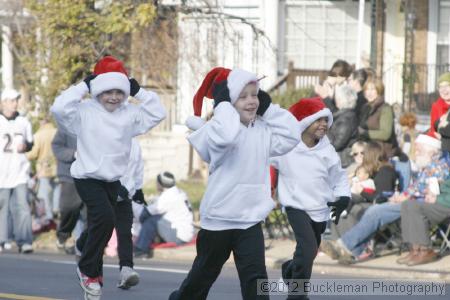 40th Annual Mayors Christmas Parade 2012\nPhotography by: Buckleman Photography\nall images ©2012 Buckleman Photography\nThe images displayed here are of low resolution;\nReprints available,  please contact us: \ngerard@bucklemanphotography.com\n410.608.7990\nbucklemanphotography.com\nFile Number 2441.jpg