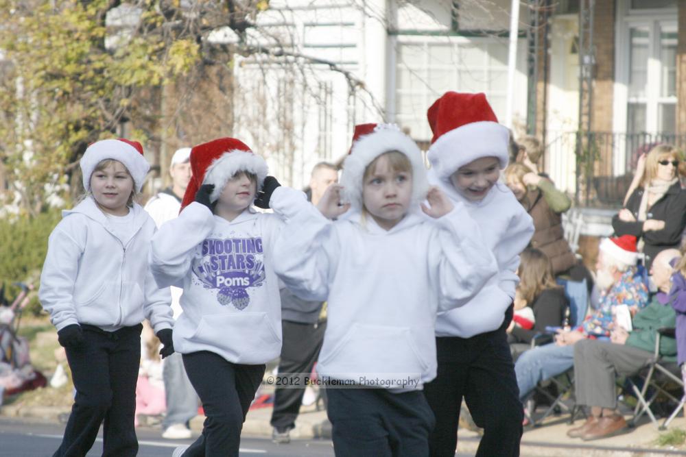 40th Annual Mayors Christmas Parade 2012\nPhotography by: Buckleman Photography\nall images ©2012 Buckleman Photography\nThe images displayed here are of low resolution;\nReprints available,  please contact us: \ngerard@bucklemanphotography.com\n410.608.7990\nbucklemanphotography.com\nFile Number 2442.jpg