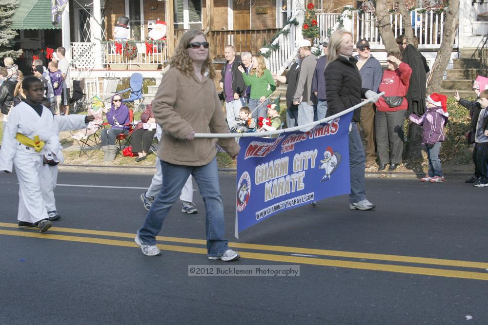 40th Annual Mayors Christmas Parade 2012\nPhotography by: Buckleman Photography\nall images ©2012 Buckleman Photography\nThe images displayed here are of low resolution;\nReprints available,  please contact us: \ngerard@bucklemanphotography.com\n410.608.7990\nbucklemanphotography.com\nFile Number 2494.jpg