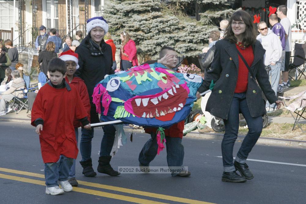 40th Annual Mayors Christmas Parade 2012\nPhotography by: Buckleman Photography\nall images ©2012 Buckleman Photography\nThe images displayed here are of low resolution;\nReprints available,  please contact us: \ngerard@bucklemanphotography.com\n410.608.7990\nbucklemanphotography.com\nFile Number 2505.jpg