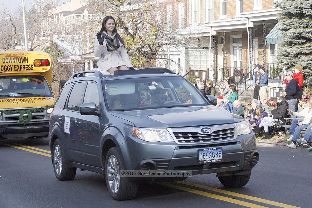 40th Annual Mayors Christmas Parade 2012\nPhotography by: Buckleman Photography\nall images ©2012 Buckleman Photography\nThe images displayed here are of low resolution;\nReprints available,  please contact us: \ngerard@bucklemanphotography.com\n410.608.7990\nbucklemanphotography.com\nFile Number 2542.jpg