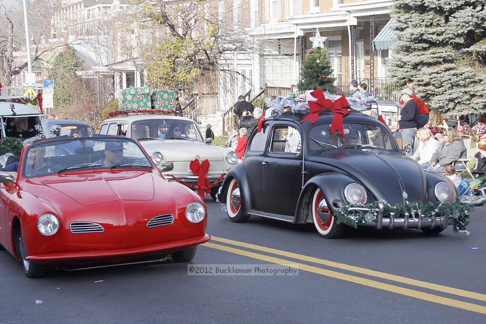 40th Annual Mayors Christmas Parade 2012\nPhotography by: Buckleman Photography\nall images ©2012 Buckleman Photography\nThe images displayed here are of low resolution;\nReprints available,  please contact us: \ngerard@bucklemanphotography.com\n410.608.7990\nbucklemanphotography.com\nFile Number 2549.jpg