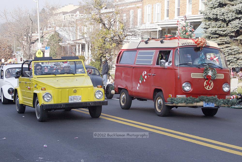 40th Annual Mayors Christmas Parade 2012\nPhotography by: Buckleman Photography\nall images ©2012 Buckleman Photography\nThe images displayed here are of low resolution;\nReprints available,  please contact us: \ngerard@bucklemanphotography.com\n410.608.7990\nbucklemanphotography.com\nFile Number 2553.jpg