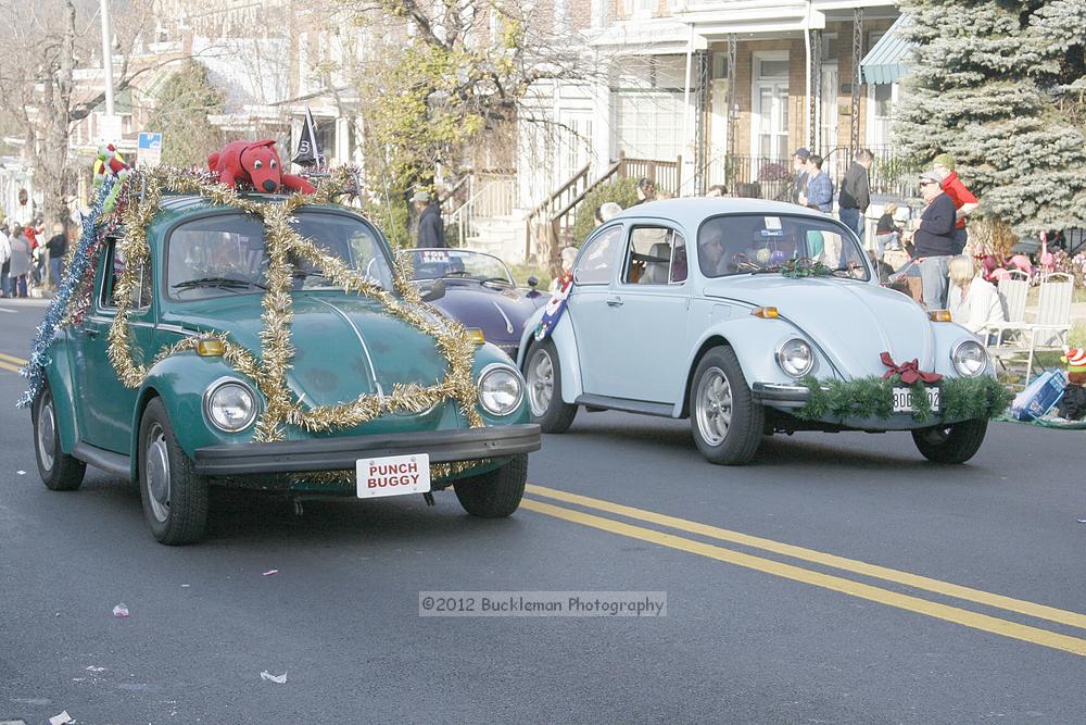 40th Annual Mayors Christmas Parade 2012\nPhotography by: Buckleman Photography\nall images ©2012 Buckleman Photography\nThe images displayed here are of low resolution;\nReprints available,  please contact us: \ngerard@bucklemanphotography.com\n410.608.7990\nbucklemanphotography.com\nFile Number 2557.jpg