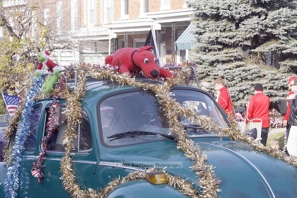 40th Annual Mayors Christmas Parade 2012\nPhotography by: Buckleman Photography\nall images ©2012 Buckleman Photography\nThe images displayed here are of low resolution;\nReprints available,  please contact us: \ngerard@bucklemanphotography.com\n410.608.7990\nbucklemanphotography.com\nFile Number 2558.jpg