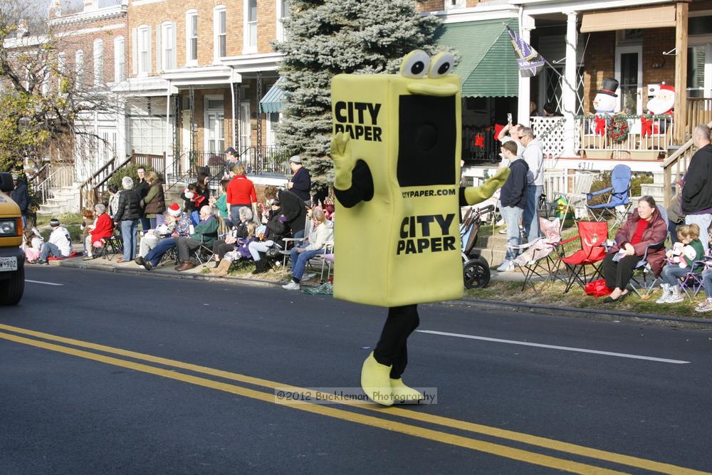 40th Annual Mayors Christmas Parade 2012\nPhotography by: Buckleman Photography\nall images ©2012 Buckleman Photography\nThe images displayed here are of low resolution;\nReprints available,  please contact us: \ngerard@bucklemanphotography.com\n410.608.7990\nbucklemanphotography.com\nFile Number 2561.jpg