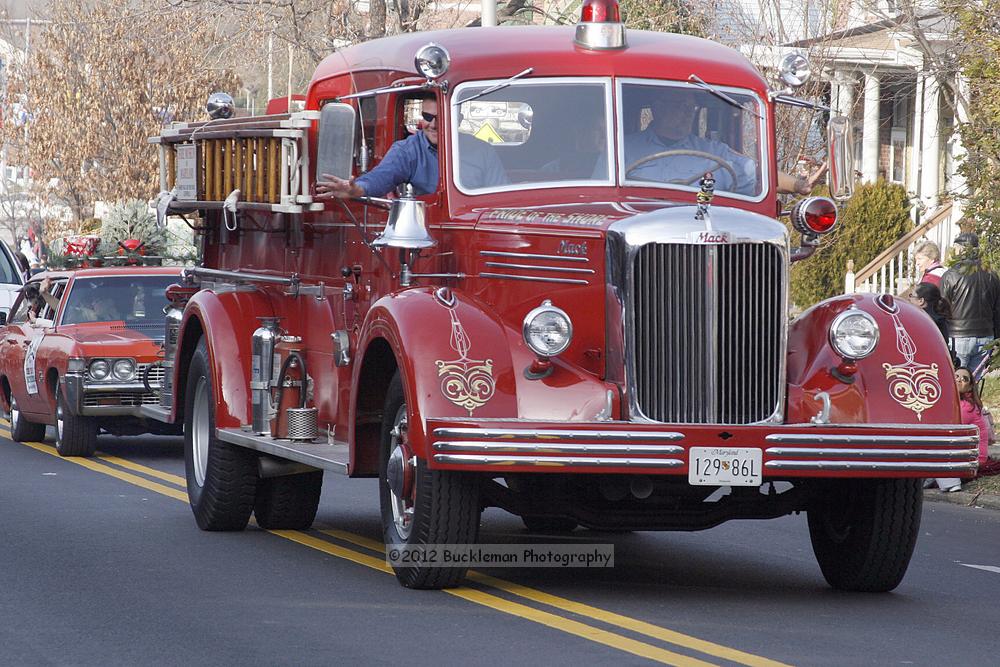 40th Annual Mayors Christmas Parade 2012\nPhotography by: Buckleman Photography\nall images ©2012 Buckleman Photography\nThe images displayed here are of low resolution;\nReprints available,  please contact us: \ngerard@bucklemanphotography.com\n410.608.7990\nbucklemanphotography.com\nFile Number 2568.jpg