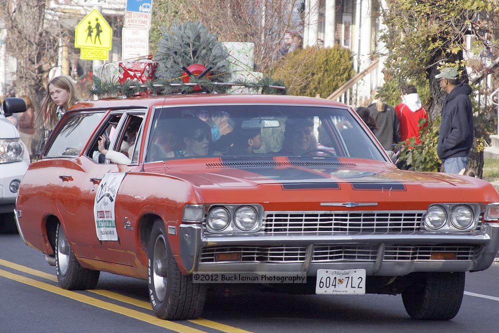 40th Annual Mayors Christmas Parade 2012\nPhotography by: Buckleman Photography\nall images ©2012 Buckleman Photography\nThe images displayed here are of low resolution;\nReprints available,  please contact us: \ngerard@bucklemanphotography.com\n410.608.7990\nbucklemanphotography.com\nFile Number 2569.jpg