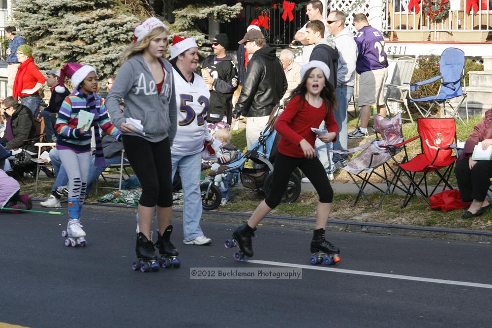 40th Annual Mayors Christmas Parade 2012\nPhotography by: Buckleman Photography\nall images ©2012 Buckleman Photography\nThe images displayed here are of low resolution;\nReprints available,  please contact us: \ngerard@bucklemanphotography.com\n410.608.7990\nbucklemanphotography.com\nFile Number 2614.jpg