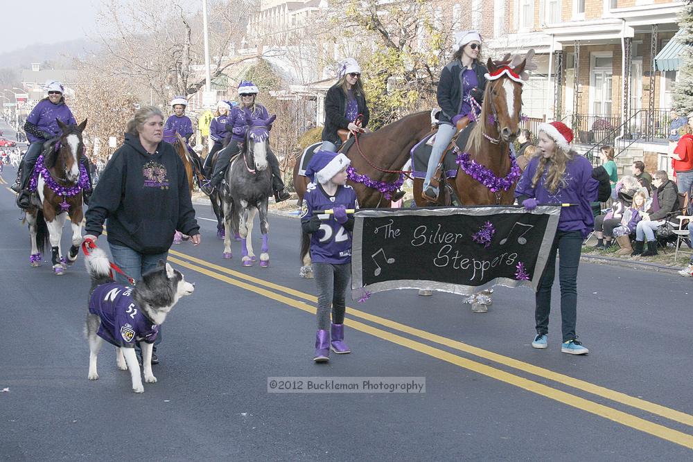 40th Annual Mayors Christmas Parade 2012\nPhotography by: Buckleman Photography\nall images ©2012 Buckleman Photography\nThe images displayed here are of low resolution;\nReprints available,  please contact us: \ngerard@bucklemanphotography.com\n410.608.7990\nbucklemanphotography.com\nFile Number 2618.jpg