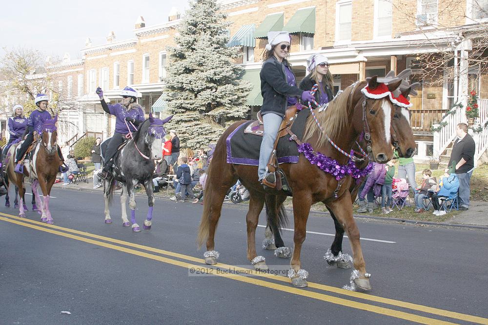 40th Annual Mayors Christmas Parade 2012\nPhotography by: Buckleman Photography\nall images ©2012 Buckleman Photography\nThe images displayed here are of low resolution;\nReprints available,  please contact us: \ngerard@bucklemanphotography.com\n410.608.7990\nbucklemanphotography.com\nFile Number 2623.jpg