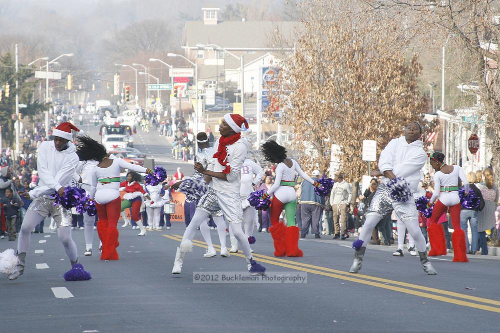 40th Annual Mayors Christmas Parade 2012\nPhotography by: Buckleman Photography\nall images ©2012 Buckleman Photography\nThe images displayed here are of low resolution;\nReprints available,  please contact us: \ngerard@bucklemanphotography.com\n410.608.7990\nbucklemanphotography.com\nFile Number 2633.jpg